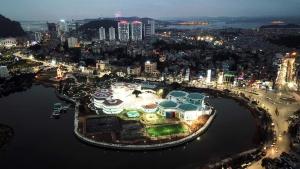 an aerial view of a city at night at Hải Quân Motel in Ha Long