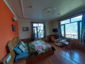 Posezení v ubytování The East Ridge Cottage by Atrangiz Stays