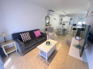 Część wypoczynkowa w obiekcie Apartamento Calle Huelva by CasaTuristica