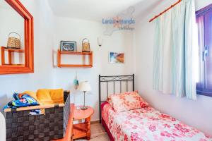 Postel nebo postele na pokoji v ubytování Casita el Faro en Playa Bastian aircon in the bedrooms VV + 37 fotografií