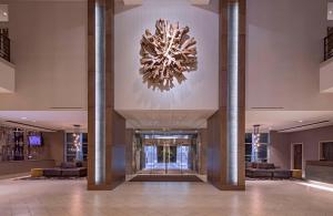 a lobby with a chandelier in a building at Hyatt Regency Sacramento in Sacramento