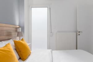 Posteľ alebo postele v izbe v ubytovaní Liberty Apt by halu! Apartments