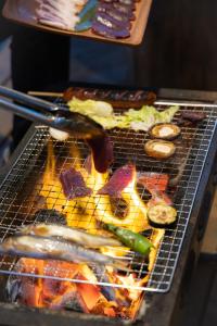 a grill with many different types of food on it at CampBaseKadojin - Vacation STAY 33535v in Tenkawa