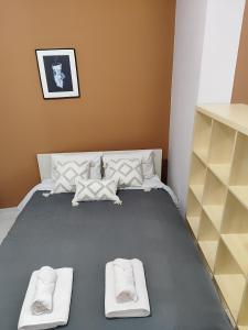 Posteľ alebo postele v izbe v ubytovaní Charilia house