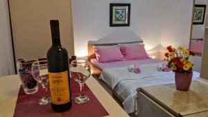 Ένα ή περισσότερα κρεβάτια σε δωμάτιο στο Apartments Villa PM