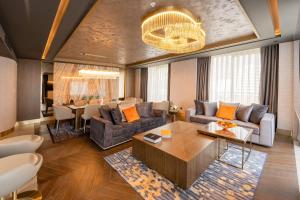Posezení v ubytování Merit Starlit Hotel & Residences