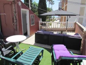 Balkón nebo terasa v ubytování Casa ELI "Casa Marenga" A 50m de playa
