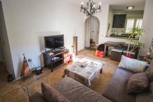 TV a/nebo společenská místnost v ubytování Casa ELI "Casa Marenga" A 50m de playa