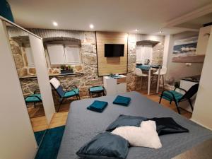 Postel nebo postele na pokoji v ubytování Apartman Barocco Lovran