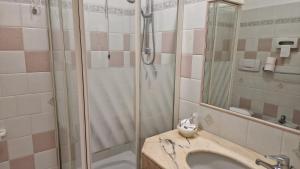 Koupelna v ubytování Hotel Dogana