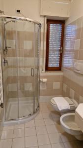 Koupelna v ubytování Hotel Dogana