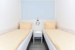 Postel nebo postele na pokoji v ubytování Residenz Waterkant