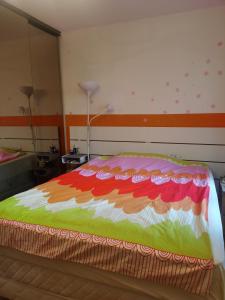 En eller flere senge i et værelse på PARIS 16eme -PSG Stade