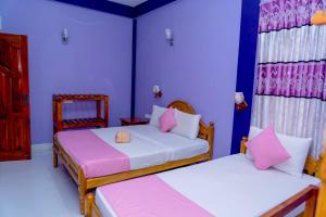 Voodi või voodid majutusasutuse SNP Star Guest House toas