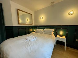 Ένα ή περισσότερα κρεβάτια σε δωμάτιο στο Absolute Clapham