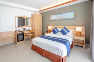 Postel nebo postele na pokoji v ubytování Ayala Oceanview Maldives