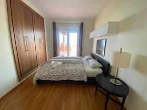 Postel nebo postele na pokoji v ubytování Apartamentos Turísticos Spiritmar