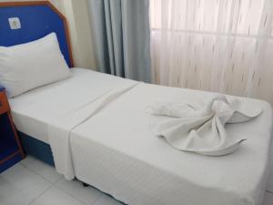 Postel nebo postele na pokoji v ubytování Dilhan Hotel