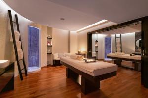 Кровать или кровати в номере Elysium Resort & Spa