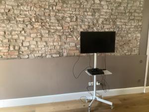 A television and/or entertainment centre at The closest to the Boboli Gardens