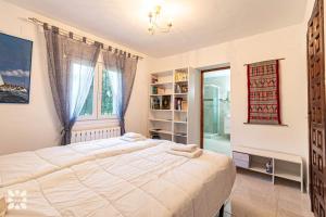 Postel nebo postele na pokoji v ubytování Villa Alamito by Abahana Villas