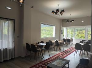 Area soggiorno di Ενοικιαζόμενα Δωμάτια Ενιπεύς- Rooms Enipeas