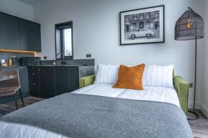 Кровать или кровати в номере Cefni Lodge