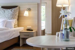 Postel nebo postele na pokoji v ubytování Hotel See-Villa