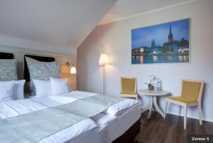 Postel nebo postele na pokoji v ubytování Hotel See-Villa