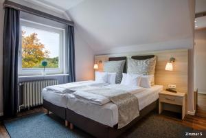 Postel nebo postele na pokoji v ubytování Hotel See-Villa