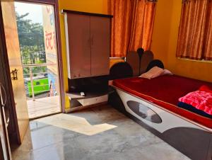 Ένα ή περισσότερα κρεβάτια σε δωμάτιο στο Hotel Shobha and Tent House