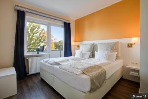 Postel nebo postele na pokoji v ubytování Hotel See-Villa
