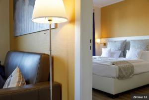 Postel nebo postele na pokoji v ubytování Hotel See-Villa