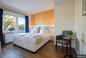 Postel nebo postele na pokoji v ubytování Hotel See-Villa