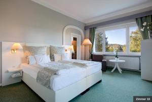 Postel nebo postele na pokoji v ubytování Hotel See-Villa