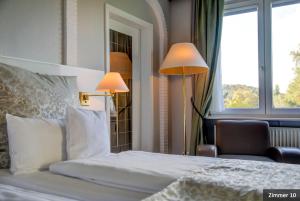 Postel nebo postele na pokoji v ubytování Hotel See-Villa