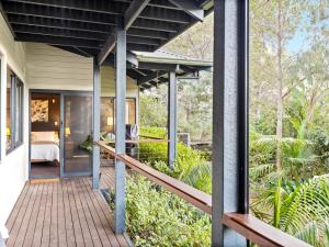 an external view of a house with a deck at Abundance in Margaret River Town
