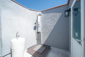 Ванная комната в Suites Coronell d'En Vila