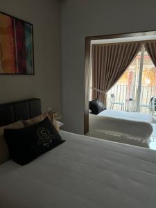 A bed or beds in a room at Maison S