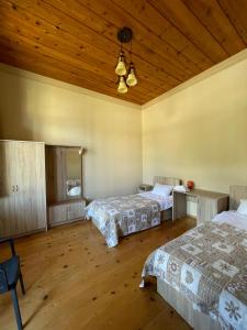 Voodi või voodid majutusasutuse Guesthouse Edena toas