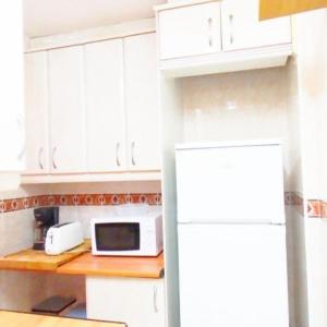 Kuchyň nebo kuchyňský kout v ubytování Apartamento En Alcalá De Henares
