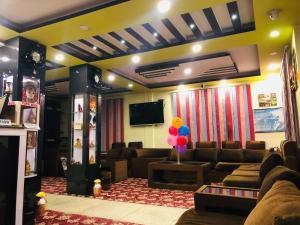 TV o dispositivi per l'intrattenimento presso Yeti Cozy Hotel