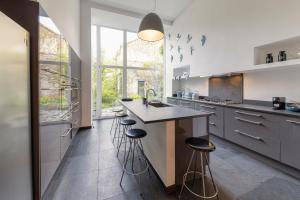 Kuchyň nebo kuchyňský kout v ubytování Atelier K - Art Guesthouse in Brussels
