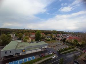 an overhead view of a city with a parking lot at Au soleil in Świnoujście