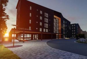 a rendering of a building with a building at Beach & Golf Resort Marinan Kapteeni - sisältää loppusiivouksen in Kalajoki