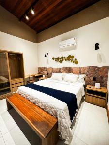 Postel nebo postele na pokoji v ubytování Villa Hortensia