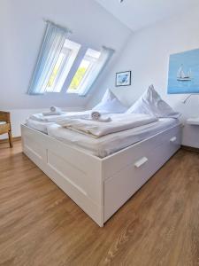 Letto o letti in una camera di Moin