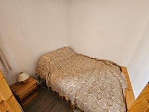 Säng eller sängar i ett rum på La Croix du Sud