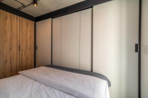 Posteľ alebo postele v izbe v ubytovaní Nadmorski Loft GREEN PORT SPA - 750 m od plaży