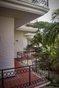 En balkong eller terrasse på Hotel Manzana Blanca 5th Avenue
